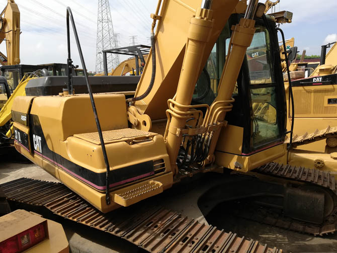 Cat 320BL with Jack Hammer