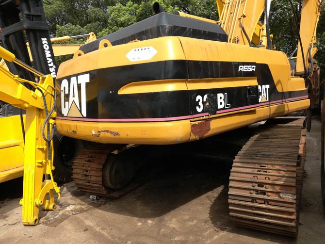 Cat 320BL with Jack Hammer